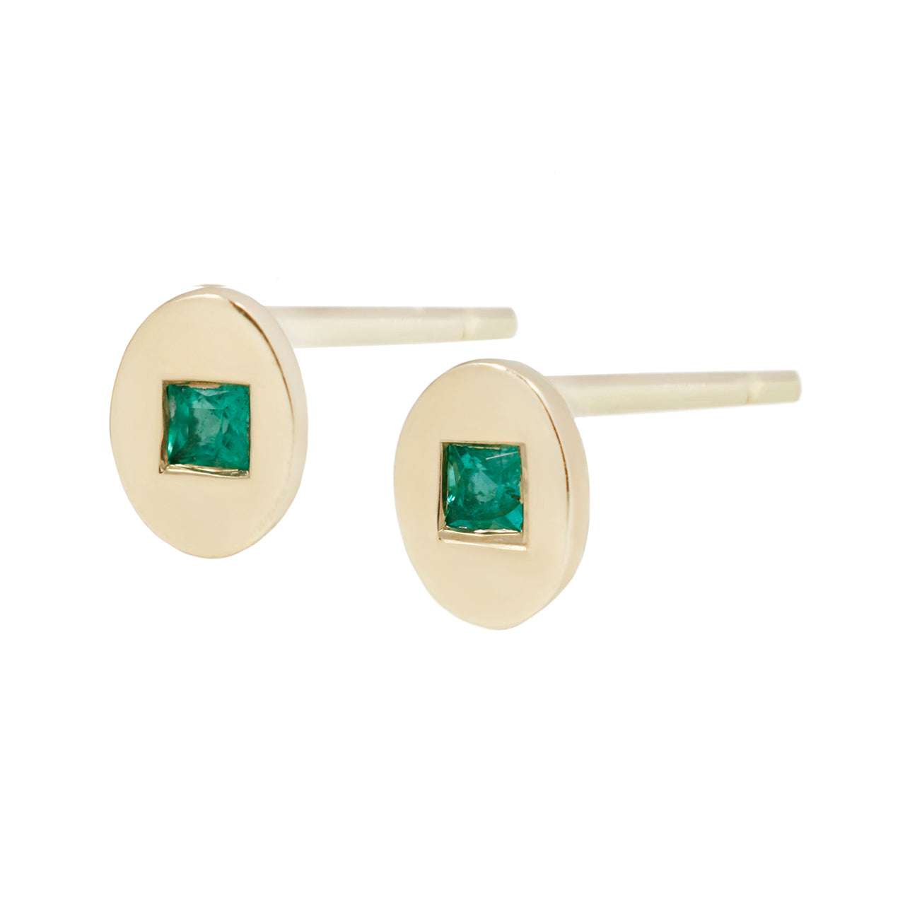 Oval studs with emeralds